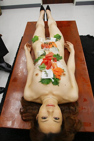 Tachiki Yui has her sexy body full of vegetables ready to eat.