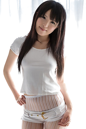 Hottie in white Sena Sakura shows off her perfect body on a big white bed
